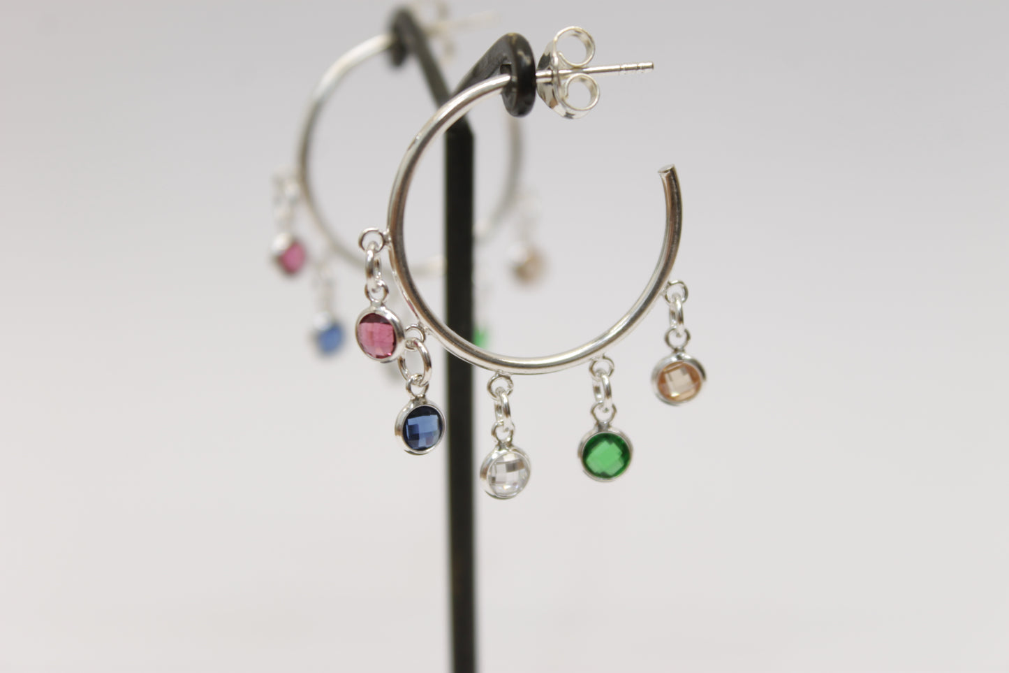 Pendientes piragües circonitas