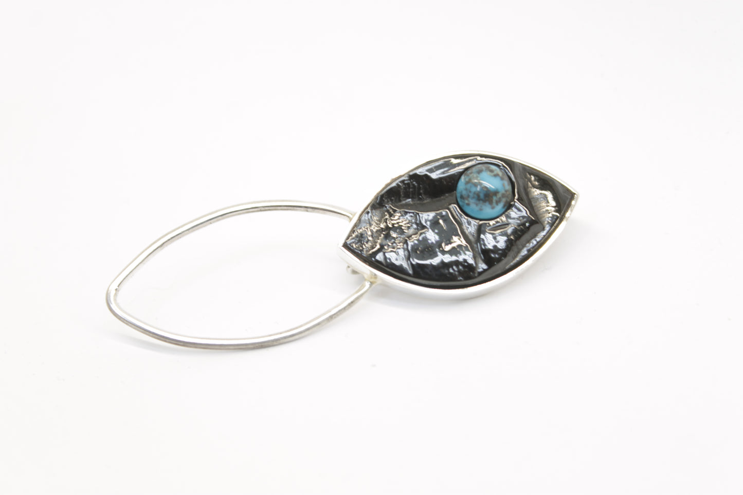 Broche azabache con turquesa